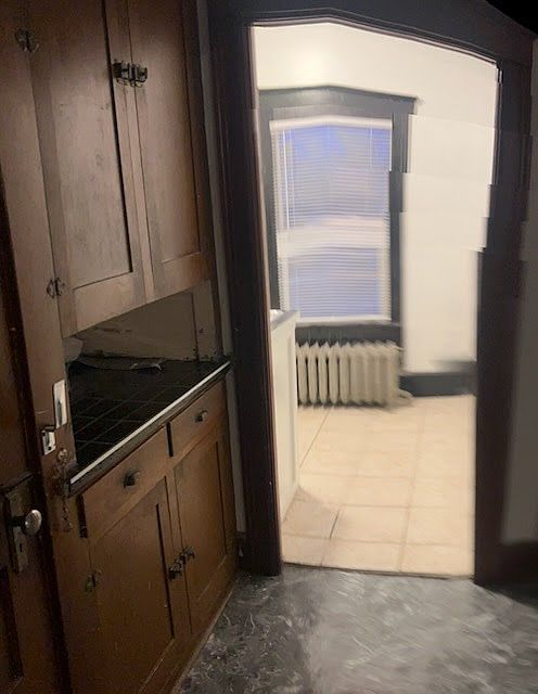 View from outside Kitchen in hallway between Living Room and Bedroom