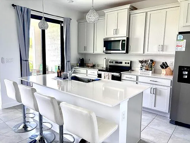 14043 SW Thorens Dr — Photo 3