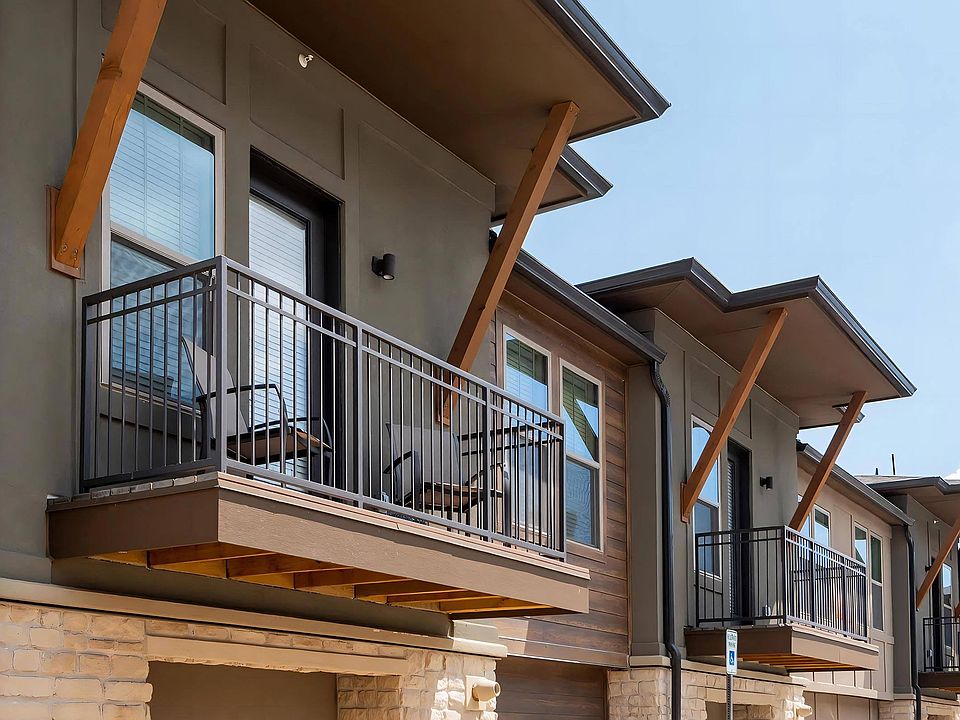 Apartment Exterior Showcasing Private Balcony Access