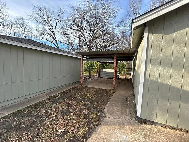 Awning between house and detached garage