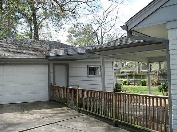 Extra finished room attached to garage.  The wooden gates were made to be movable too.
