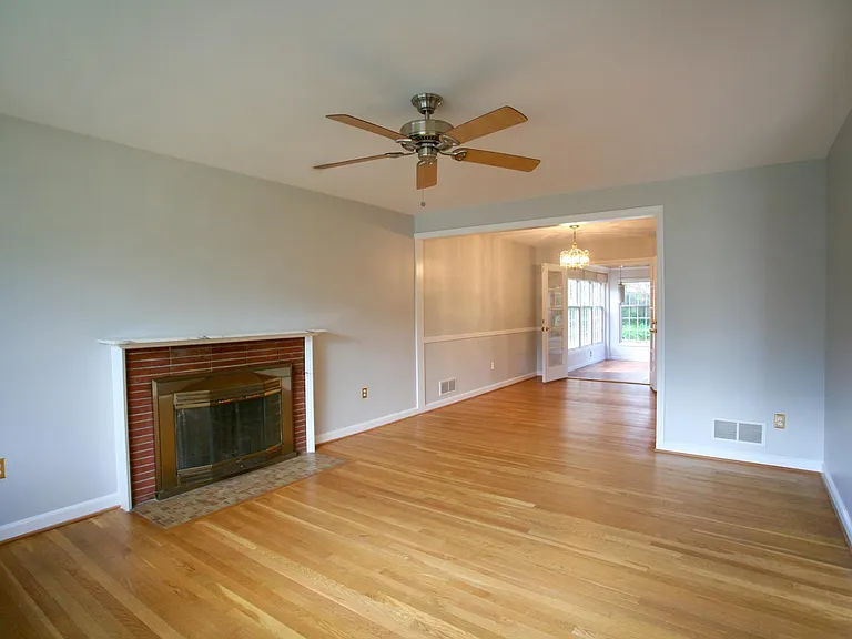 Living room flows to dining room and sun room