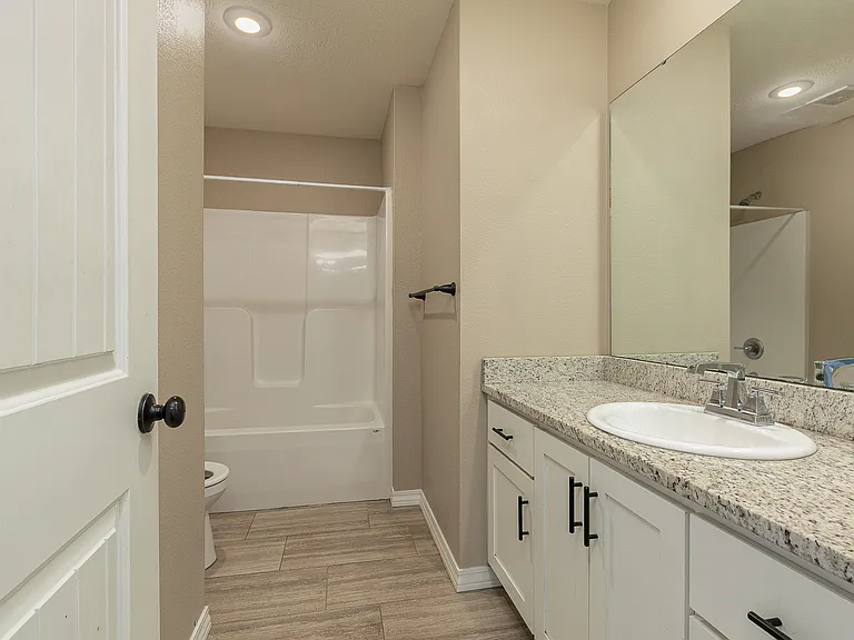 2nd full bathroom with granite countertops