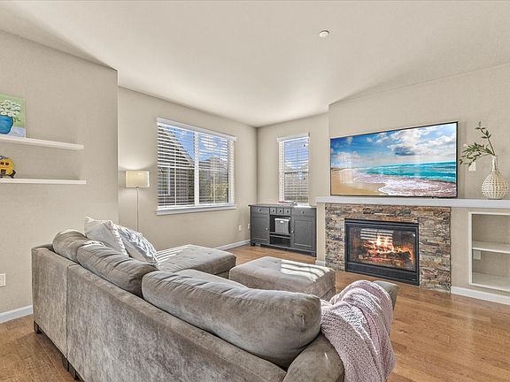 The main level is the great room with a gas fireplace and a lovely kitchen and gas cooking!