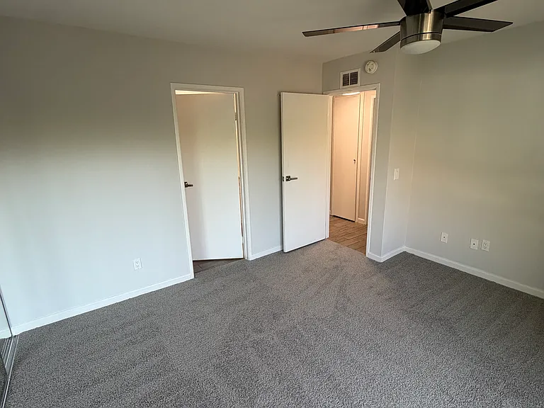 Primary bedroom with balcony and views!