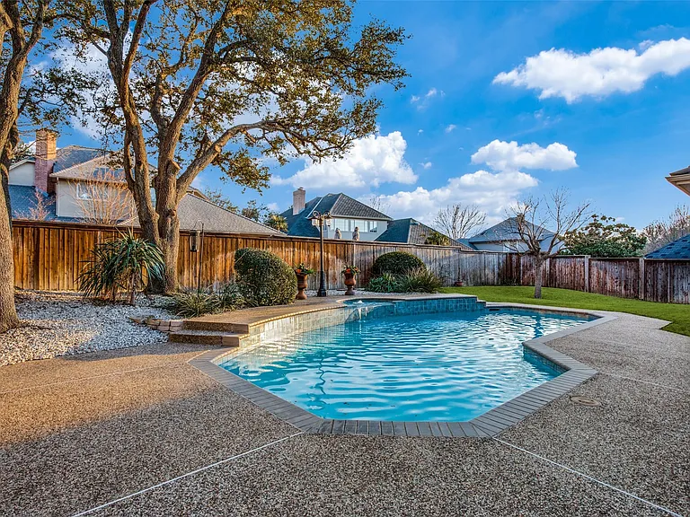Take the fun outdoors and enjoy your private pool. Ideal place to lounge and enjoy the sun. Fully fenced in backyard with a wooden privacy fence. Plenty of grass for a furry friend to play in.