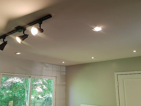 Recessed lighting and fans in multiple rooms