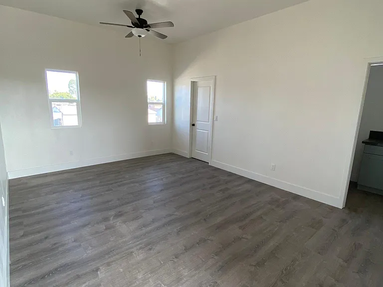 Bedroom 3 - This bedroom is a little larger than the other 2, has a walk-in closet and direct access to the balcony.