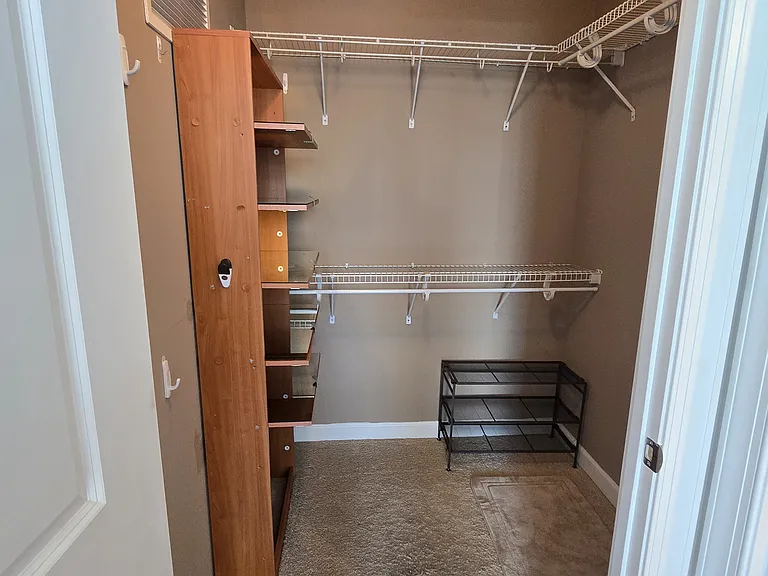 Walk in closet in the master bedroom.