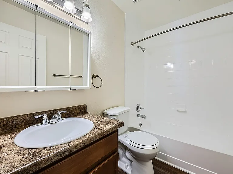 Experience the contemporary charm of this impeccably designed bathroom.