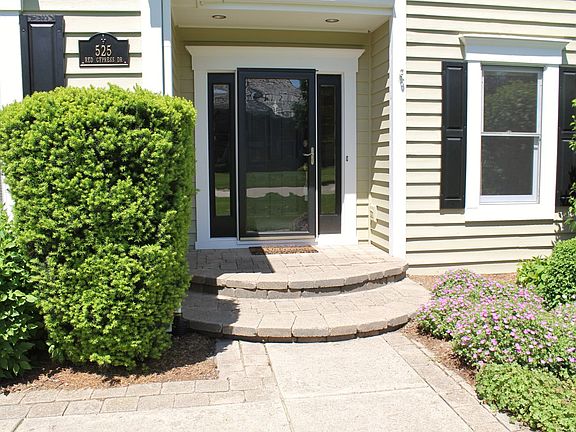 Paver Walk and Entrance leads you to this lovely home.