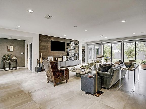 Very large open Den with so much natural light