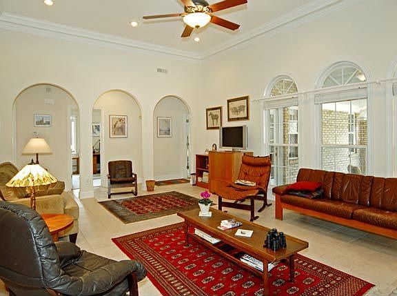 Archways welcome you to this California Style Family Room