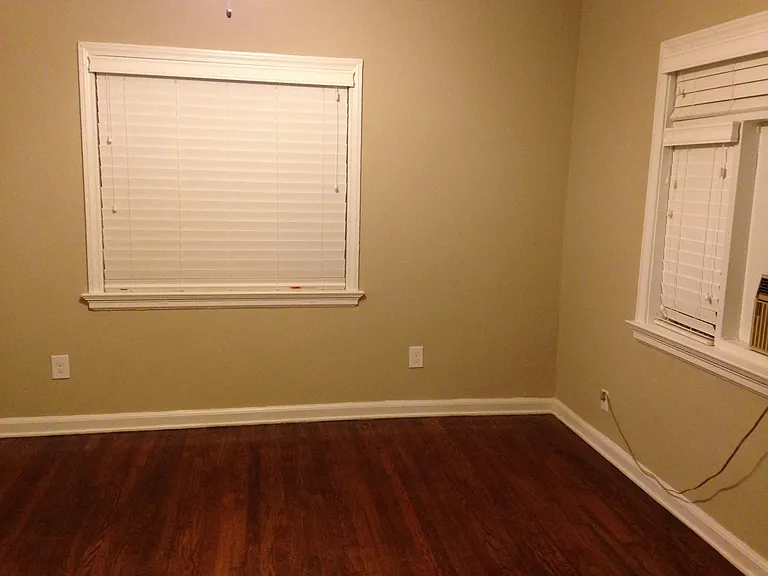 Bedroom can accommodate large bed/furnishings with lovely built-ins