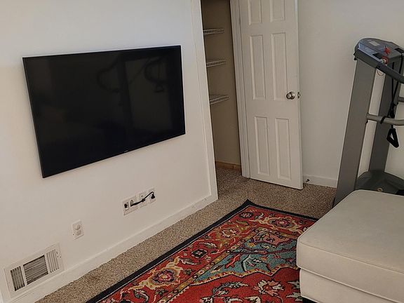 Basement living room. Lots of closet space.