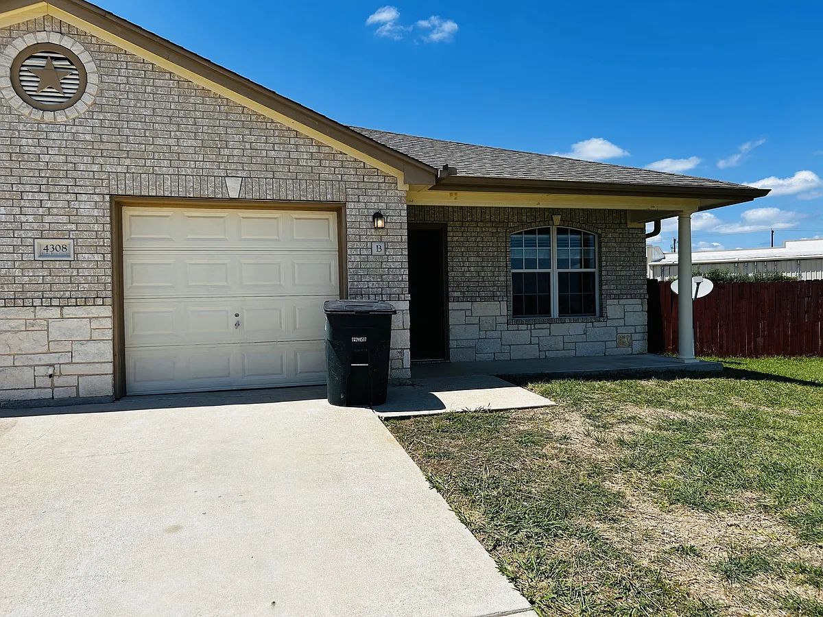 Gorgeous stone home with garage, large front yard, in a clean, friendly neighborhood. Not in a flood zone_great curb appeal and a welcoming place to call home! - 4308 Elms Run Cir #B