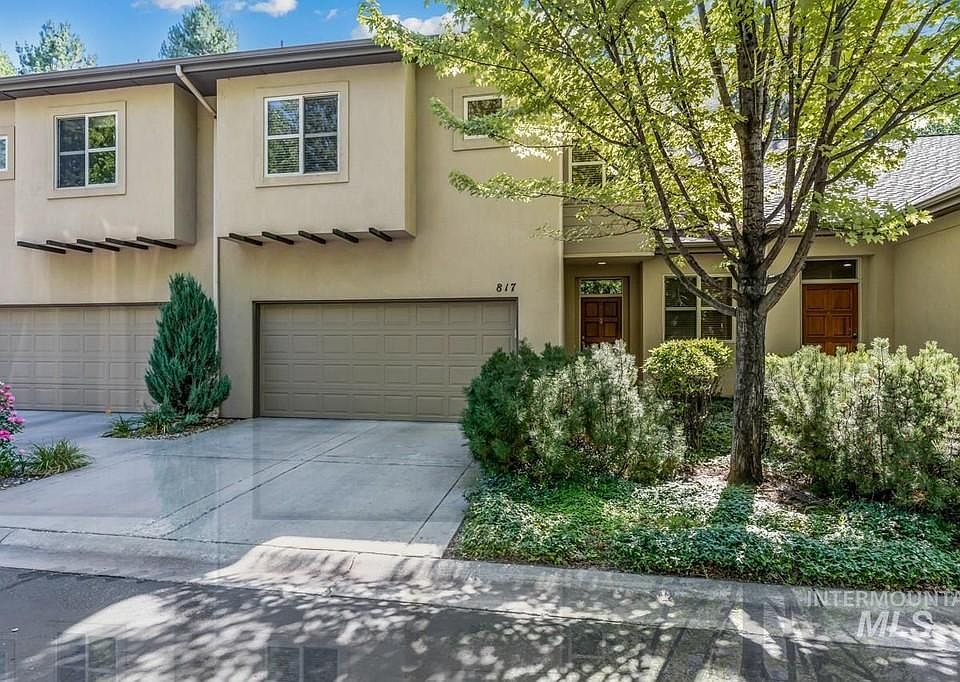 Front entry and driveway, 2 car garage.