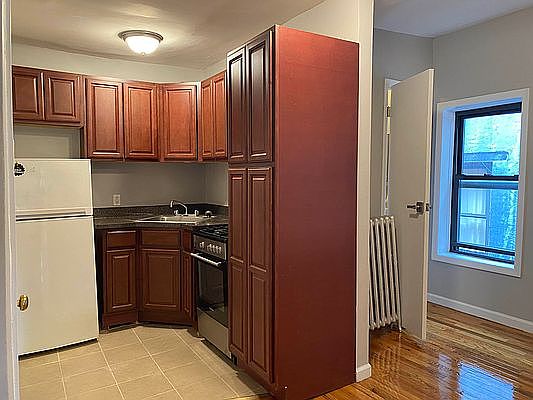 1st image of 411 E 114th St APT 18