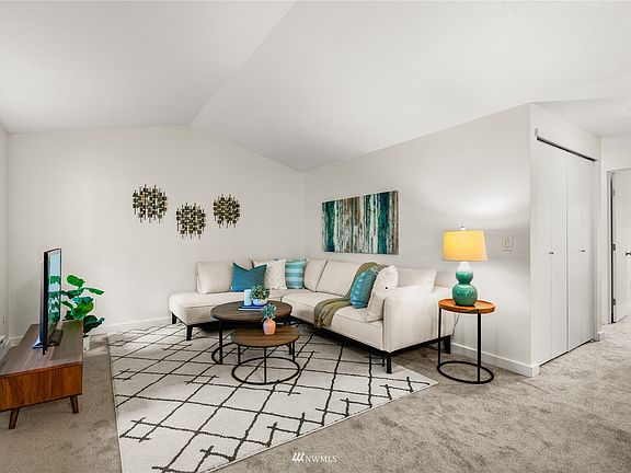 Fresh paint and new carpet complement the contemporary look of this stylish condo ready for your designer ideas.