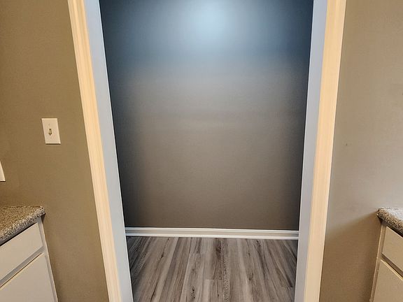 Kitchen looking into laundry room