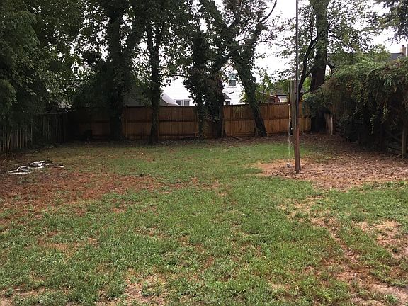 Large fenced back yard great for dogs shared with upstairs renters