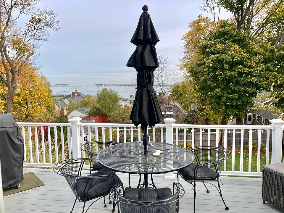 Back deck off kitchen with views Stephen's Field and Long Beach