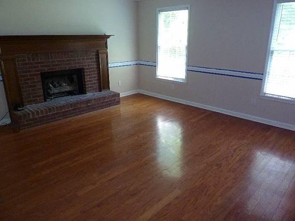 Wood Floors Lots of sun (blue tape removed, just finish pain