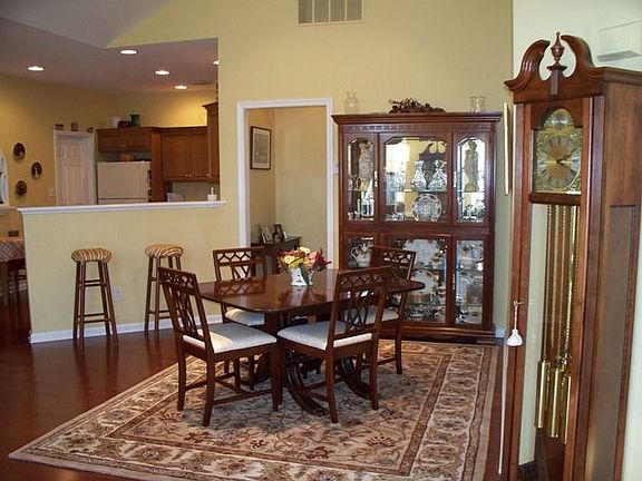 Dining Room w/ Cathedral Ceiling and Hardwood Floor