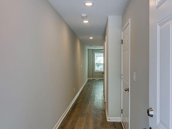 Entrance Hallway with 1/2 Bath and LARGE Laundry Room on Main Level