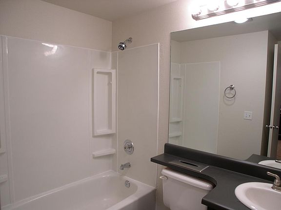 Up Dated Bath bright and clean. Ample closet storage.