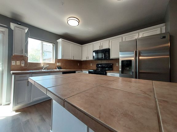4th image of 6418 Park St E