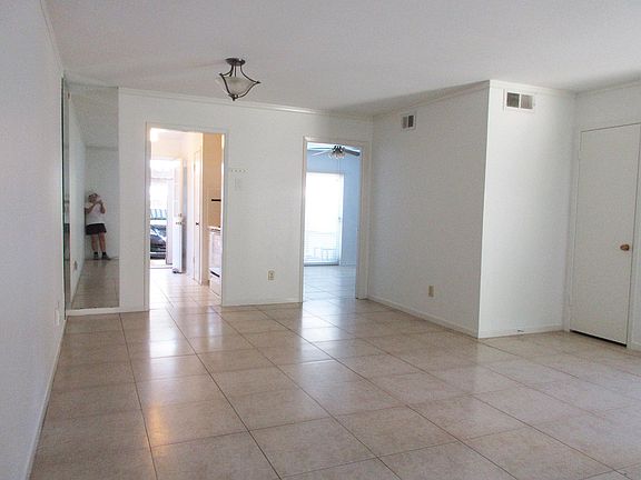 Den kitchen and downstairs bedroom or extra room