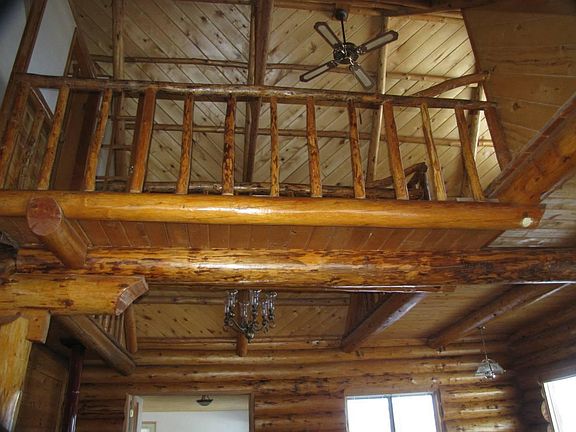 all hand peeled log railings