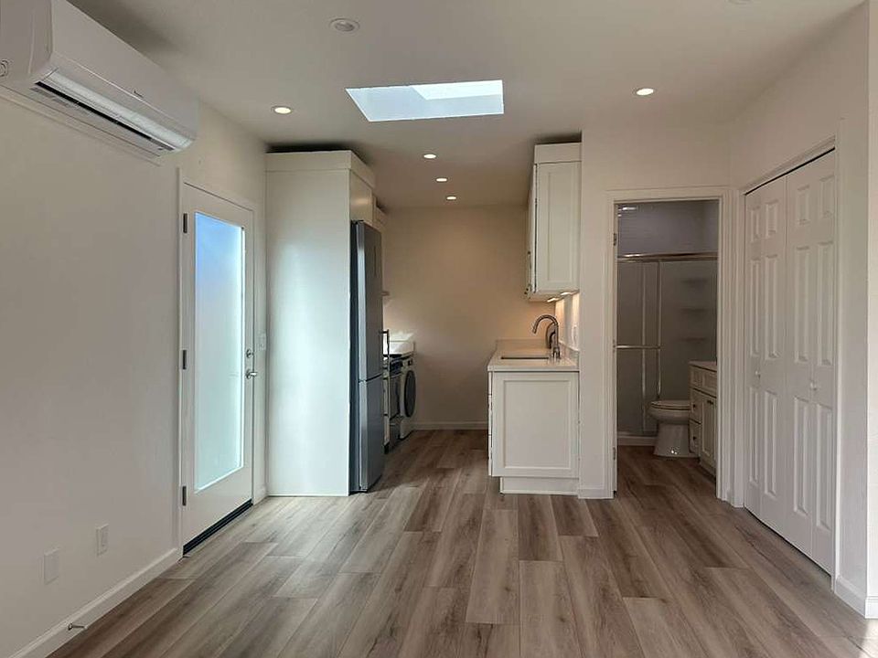 Full kitchen, full bathroom, and laundry.