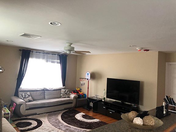 LIVING ROOM - PHOTO OF IDENTICAL APARTMENT. APARTMENT DOES NOT COME FURNISHED