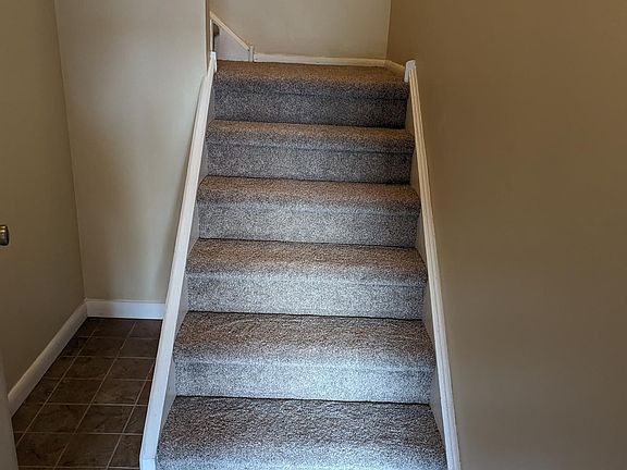 Entry with storage large enough for multiple bikes. Kayaks, paddle boards.