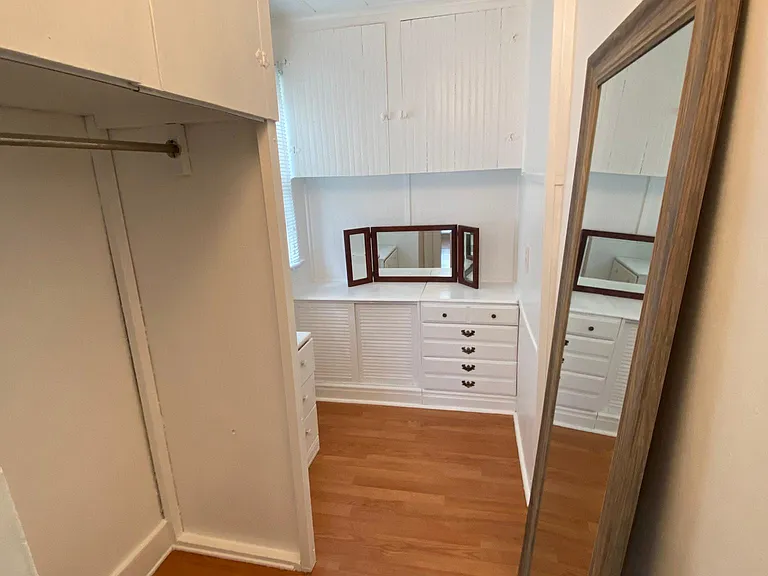 The walk-in closet in the den or third bedroom off the kitchen