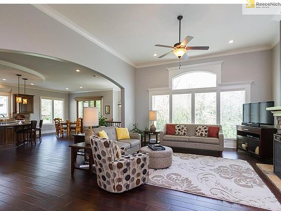 Open concept reverse 1.5 story has east sun in the morning, flooding home with natural light.