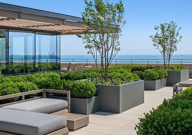 Enjoy stunning views of Lake Michigan and the Chicago skyline from the private sky terrace, complete with multiple al fresco dining areas.