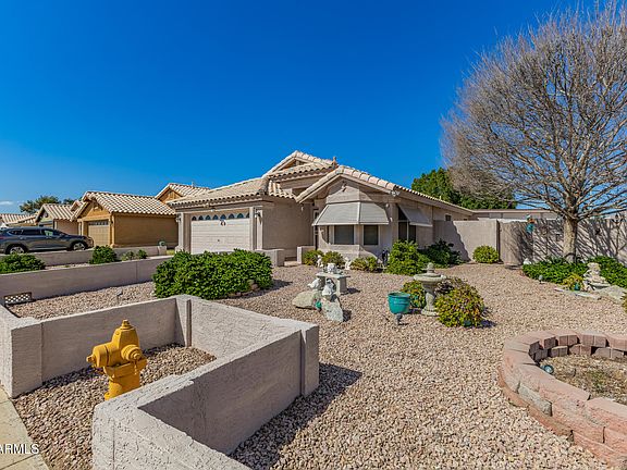 5th image of 8432 W CHARTER OAK Road