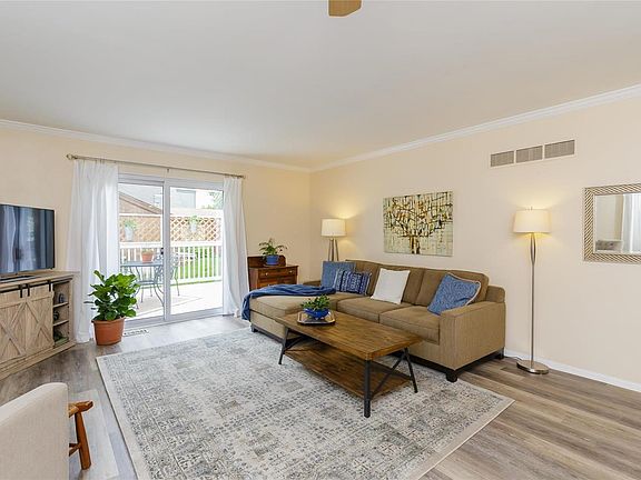 Great Room with access to outdoor deck. Spacious open room - perfect for entertaining.