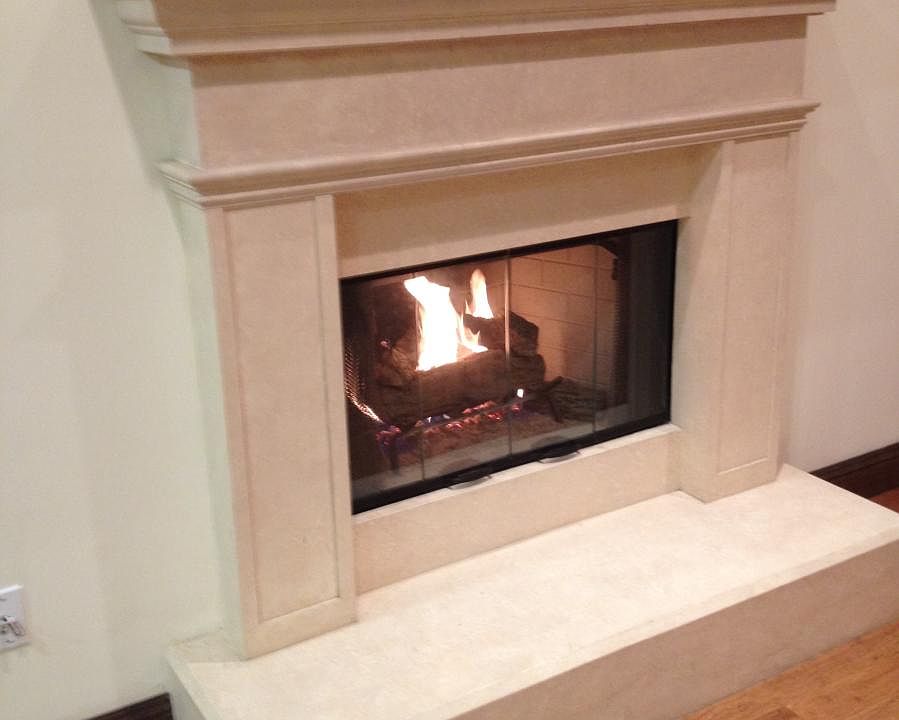 Gas fireplace, custom mantle and surround