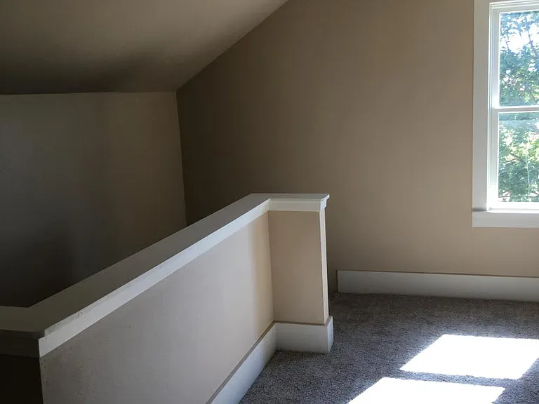 Roomy hall to upstairs to bath & bedrooms