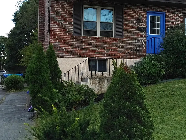 A set of stairs leads up to the Main Entrance