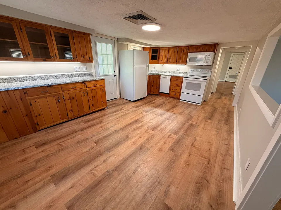 Kitchen with entry door