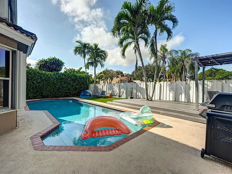 9581 NW 9th Ct — Photo 35