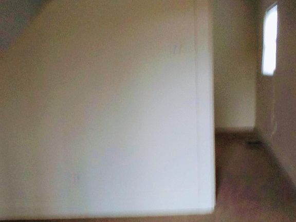 staircase dividing 1st rooms