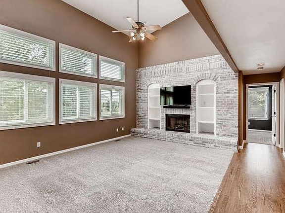 Large Open Family Room with Gas Fireplace and Vaulted Ceilin