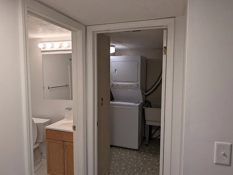 Bathroom and Laundry - View from Bedroom Door