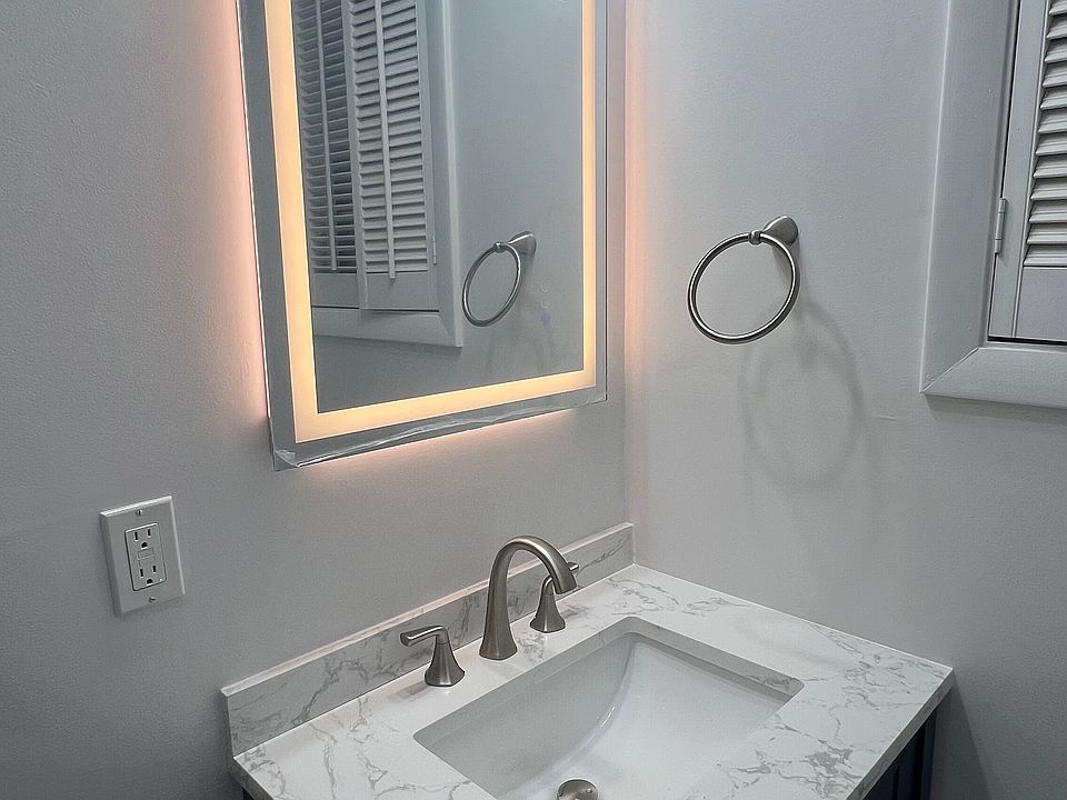 New vanity and light 3 level LED lighted and anti fog mirror for perfect make up application plus new vanity with plenty of storage too! Also all new bathroom hardware and lighting!
